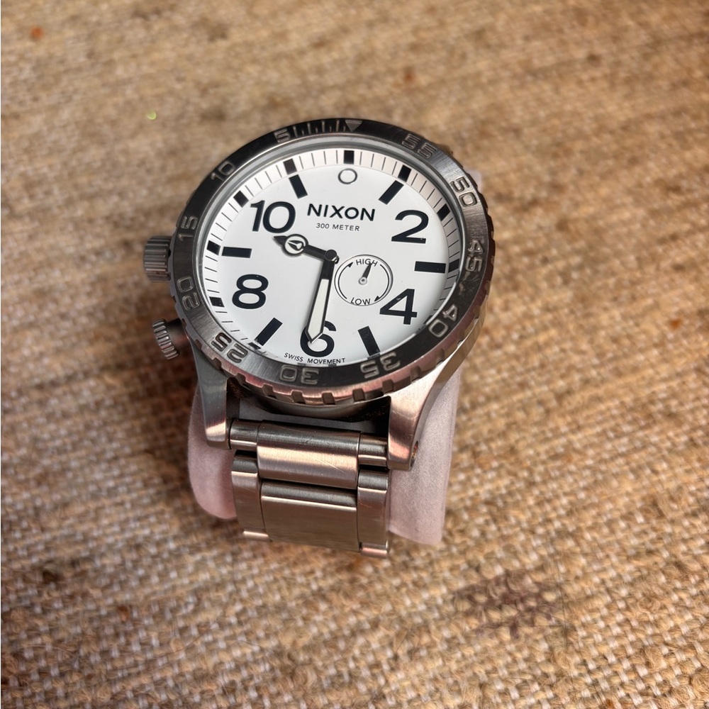 Nixon 51/30 Silver Watch with White Dial
Fits small, No extra links